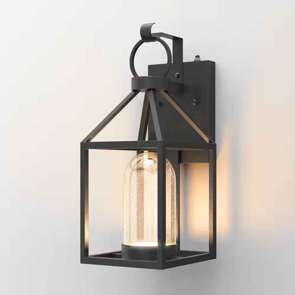 Hawaii Black Modern Dusk to Dawn Outdoor Integrated LED Hardwired Lantern Sconce with Clear Shade
